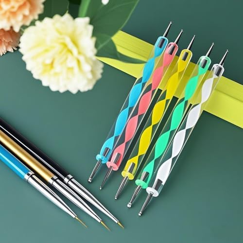 Five colorful acrylic handle dotting pens arranged on white surface
