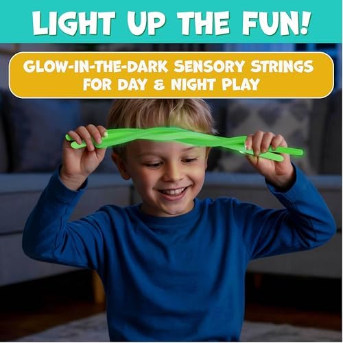 Six colorful BUNMO tactile strings glowing brightly in a dark room