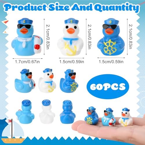 Miniature sailor cruise figurines wearing blue shirts and caps displayed on a flat surface