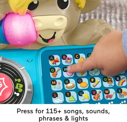 The authentic USA-imported Fisher-Price DJ Yak toy showing the battery compartment and durable design.