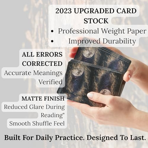 Hand holding Rider-Waite style Witchy Cauldron tarot cards