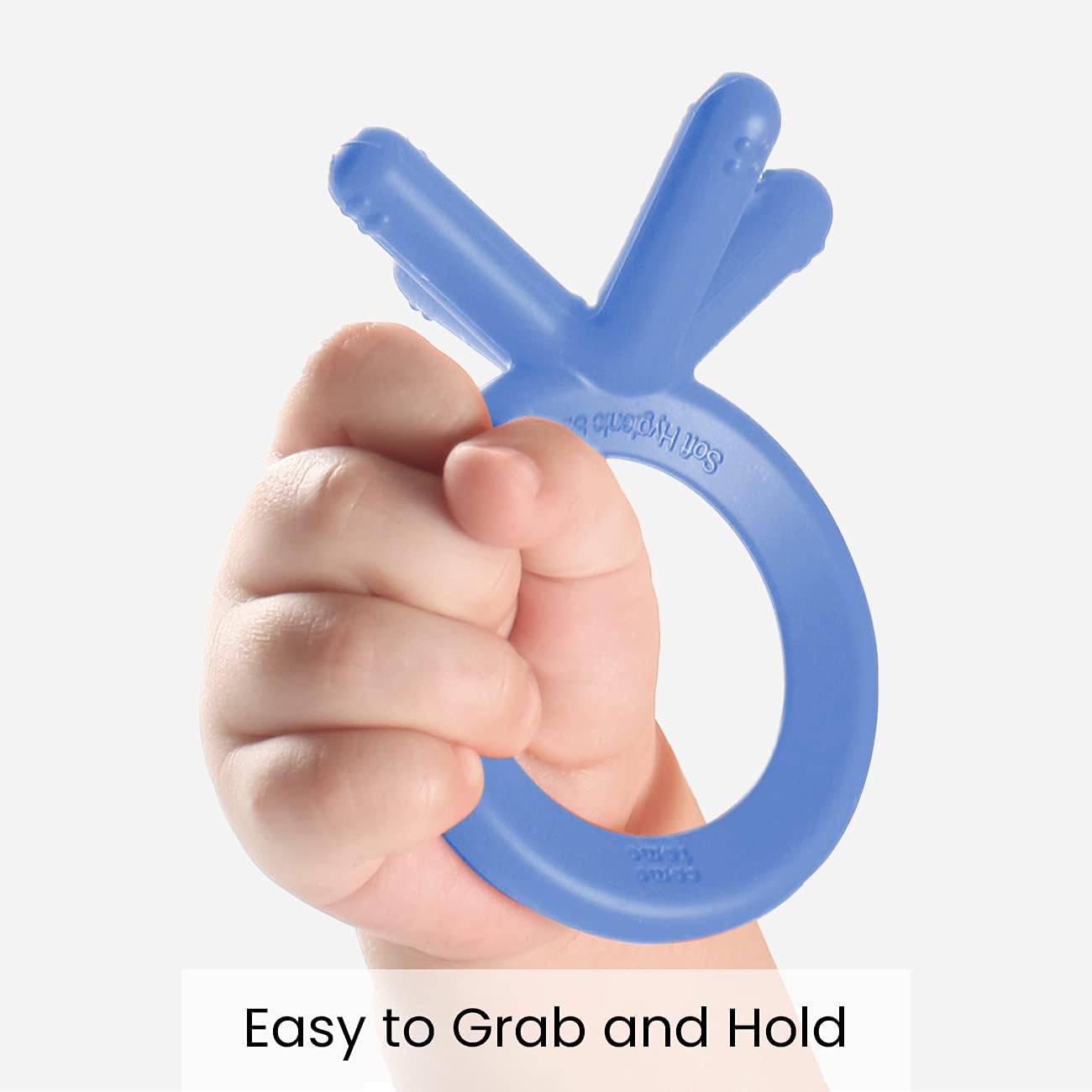 Comotomo blue silicone teether showing the circular easy grip design for babies