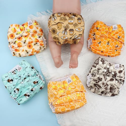 Mama Koala reusable baby diapers featuring adjustable rise and hip snaps