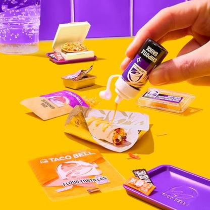 Assembling a miniature Crunchwrap Supreme replica using non edible liquid resin from the blind pack.