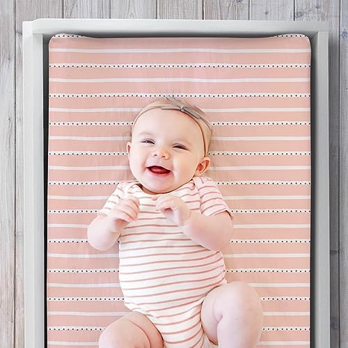 Close up of ultra soft microfiber fabric on premium baby girl diaper changing cover