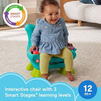 Fisher-Price electronic learning chair showing light-up pretend TV remote control and flipbook