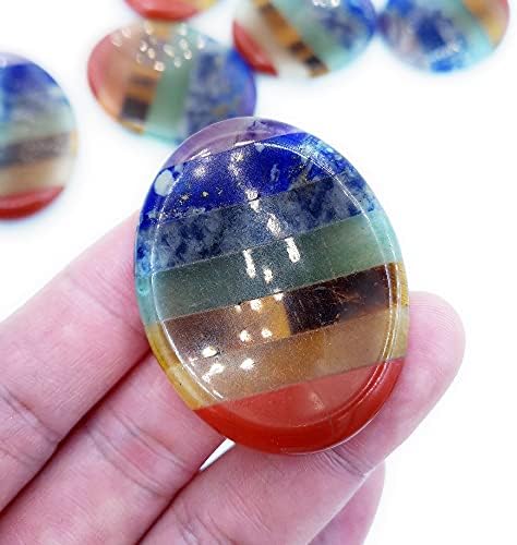 Oval shaped meditation crystal with ergonomic thumb groove for anxiety relief.