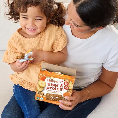 Close-up shot of the soft texture of an opened Happy Tot organic whole grain oat snack bar.