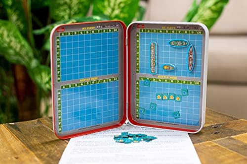 Close-up of the illustrated foam magnets and scoring pieces included in the Battle of the Boats travel set.