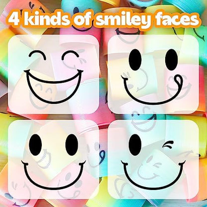 Assorted bulk pack of child-safe emoji plastic springs ideal for school classroom prizes and birthday goodie bags.