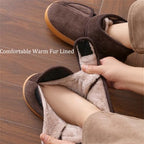 Warm snow boots for elderly with adjustable velcro closures and fur lining.