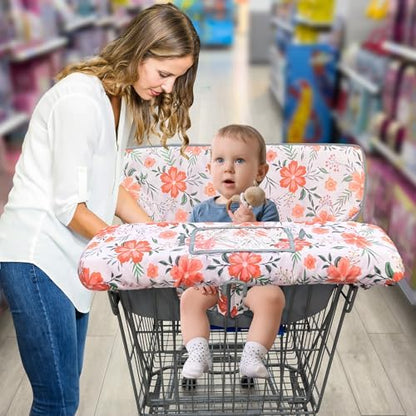 Infant girl sitting comfortably inside the floral pattern machine washable seat cover