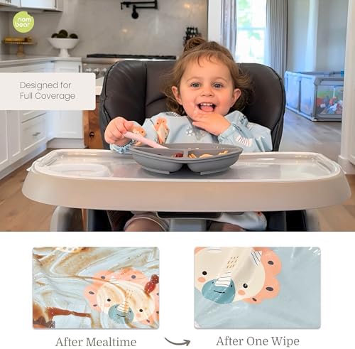 Toddler wearing long sleeve full body feeding apron with elastic cuffs close up
