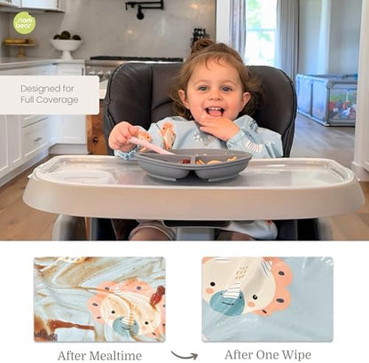 Toddler wearing long sleeve full body feeding apron with elastic cuffs close up