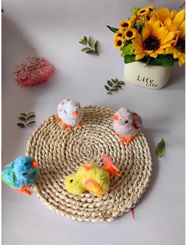 Colorful plush hopping chicken clockwork toy showcasing the manual side winding spring mechanism