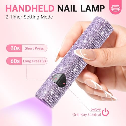 Handheld nail lamp with heart-shaped activation button