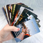 Selection of poker-sized love oracle cards spread out on a table