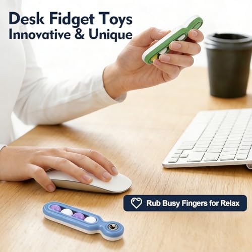 Four different colored office gadgets neatly arranged on a modern corporate desk setup for focus