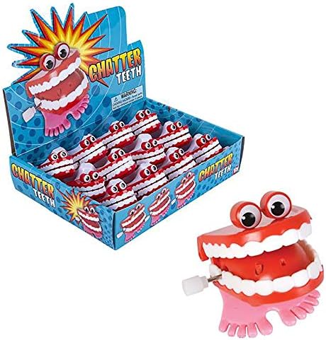 Side profile showing the manual winding dial on the durable plastic chatter teeth novelty item
