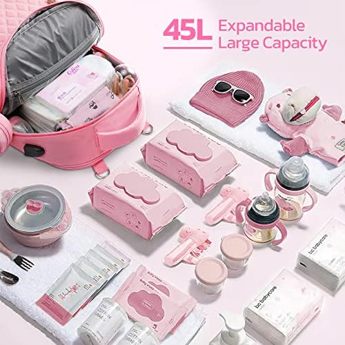 Maelstrom pink diaper backpack paired with removable cross body bottle bag
