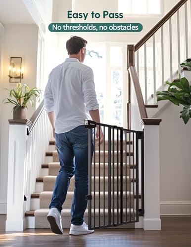 Extra wide hardware mounted dog gate protecting the top of a staircase