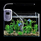 QUOZUO non toxic artificial plants being rinsed in warm water for setup preparation.