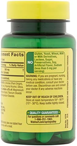 Spring Valley dietary supplement bottle next to unflavored tablets