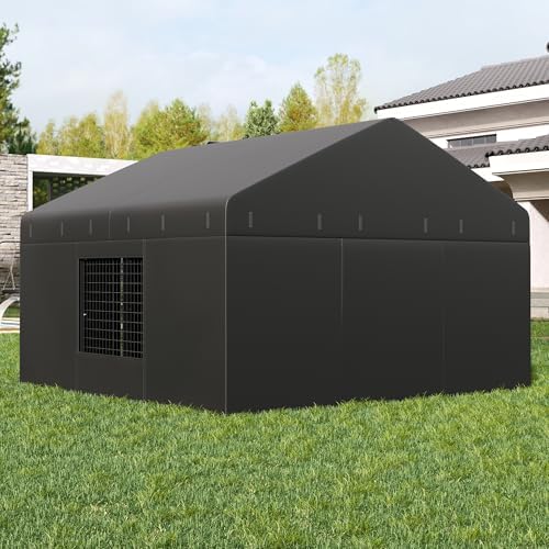 Full outdoor setup of the Petony large dog cage anchored securely on a grass surface with the protective cover attached.