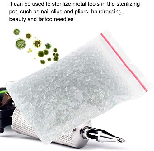 Nail clippers being sanitized in glass bead sterilizer