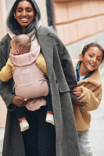 Close up of BabyBjörn adjustable head support on dusty pink mesh carrier