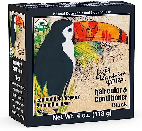Organic black henna hair dye powder in packaging