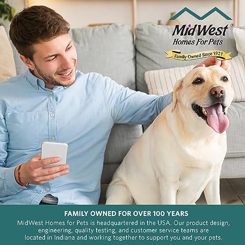 MidWest Homes for Pets graphite safety gate installed securely inside a hallway.
