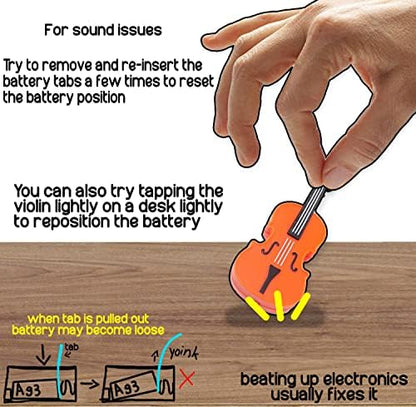 MunnyGrubbers worlds smallest violin attached to a set of keys as a funny social media meme accessory.