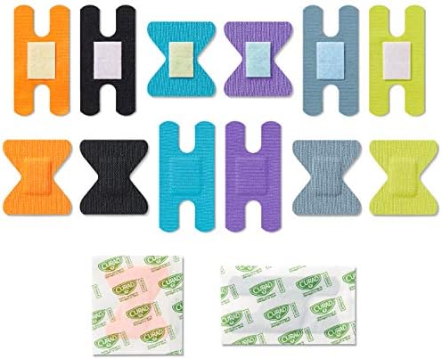 Curad extreme hold adhesive fabric bandages laid out to show assorted sizes for finger joint application