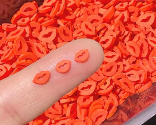 Close up of 5mm red lip shaped polymer clay sprinkles for nail art