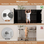 Retractable dog barrier neatly rolled up against a stairway wall bracket