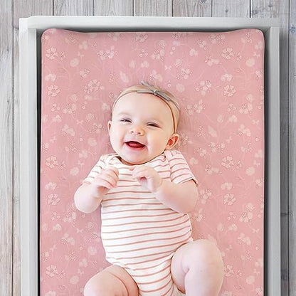 Secure all around elastic corner details on standard nursery changing pad cover