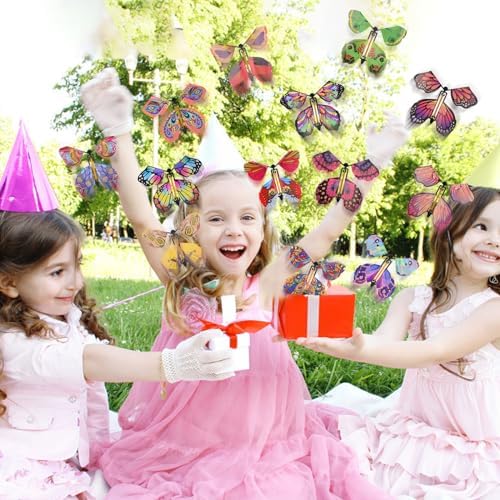 Top view of twenty different vibrant and colorful patterns of wind up flying butterfly party favors