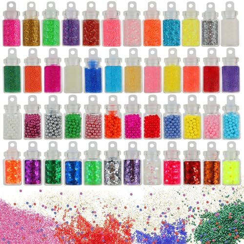 Close up of 48 individual glitter jars and resin charms for kids DIY crafts