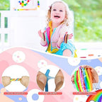 Children playing with stretchy sensory strings in a classroom setting
