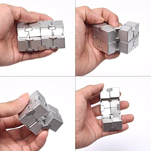 Close up of the durable stainless steel hinges connecting the eight blocks of the silver fidget cube