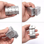 Close up of the durable stainless steel hinges connecting the eight blocks of the silver fidget cube