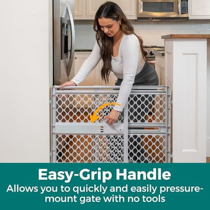 Grey plastic expandable dog gate using tool free pressure fit wall installation.
