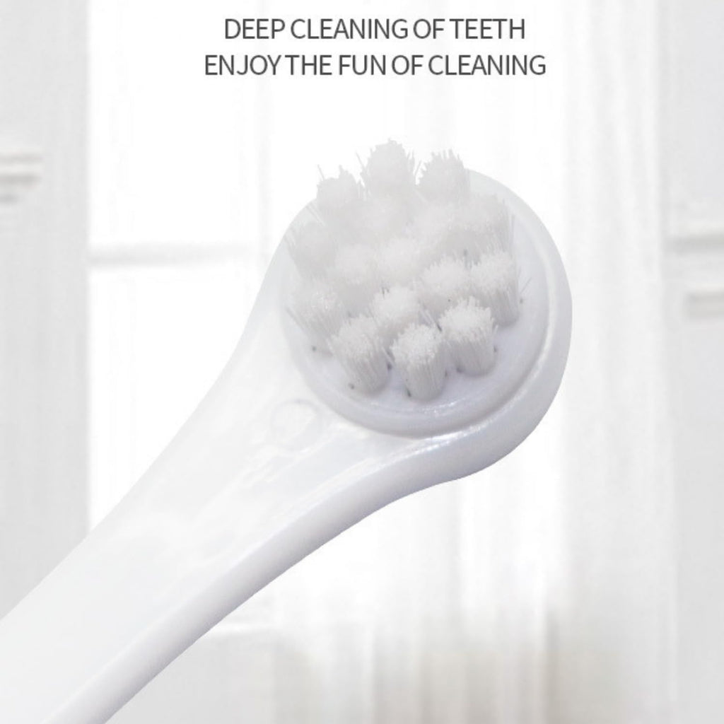 PUMEXFE small pet toothbrush close up of the tiny one centimeter brush head.