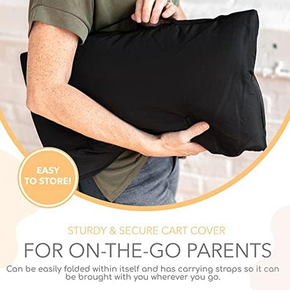 Infant sitting comfortably inside the cushioned Binxy Baby 360 degree germ protection trolley cover