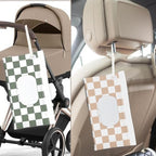 Parent using portable baby wipe dispenser on a stroller