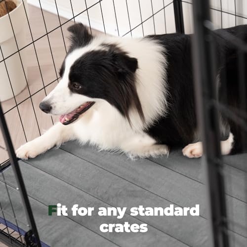 BALANCE flat dog crate pad being placed inside a small dog kennel