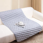 Premium dog cooling mat spread out cleanly over a living room family couch