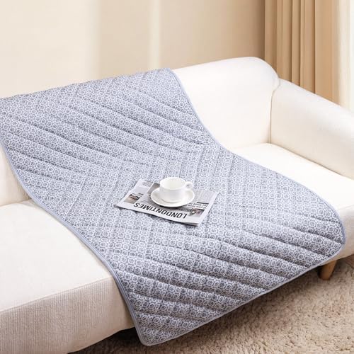 Premium dog cooling mat spread out cleanly over a living room family couch