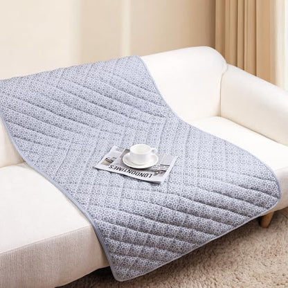 Premium dog cooling mat spread out cleanly over a living room family couch